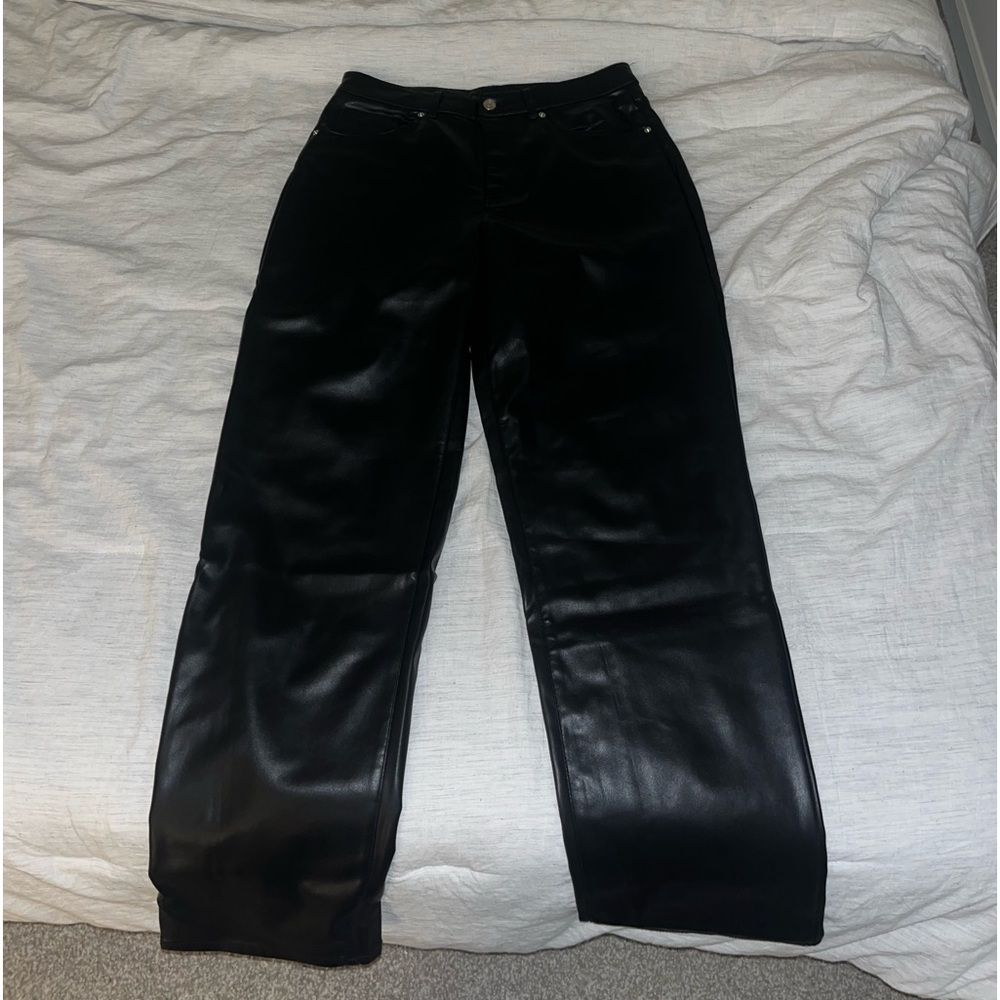 worn one faux black leather high waisted straight leg pants